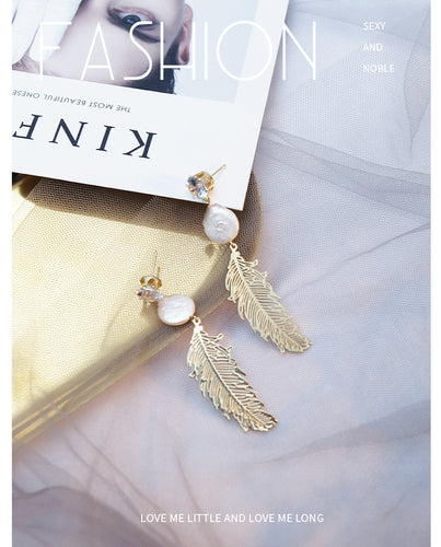 Spring and summer new European and American pearl earrings leaves S925 Baroque earrings exaggerated temperament zircon earrings female