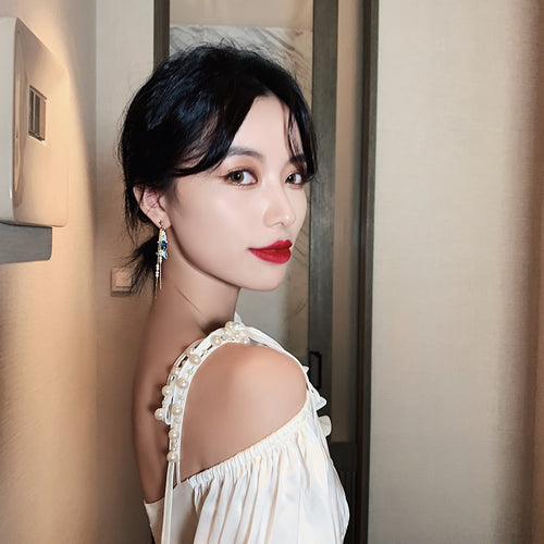 The daughter of the sea super fairy mermaid earrings asymmetric pearl shell tassel earrings lady temperament silver needle earrings