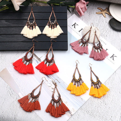 European and American creative drop-shaped tassel earrings inlaid with rice beads long section cotton earrings