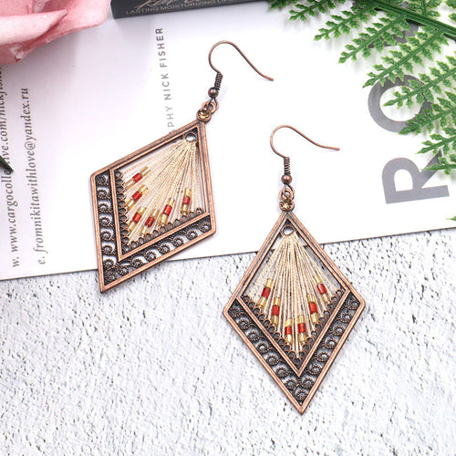 European and American fashion popular bohemian jewelry colorful gold wire braided rice pearl diamond earrings