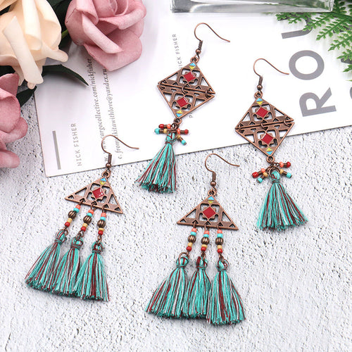 European and American fashion triangle earrings exaggerated rice beads tassel fabric earrings
