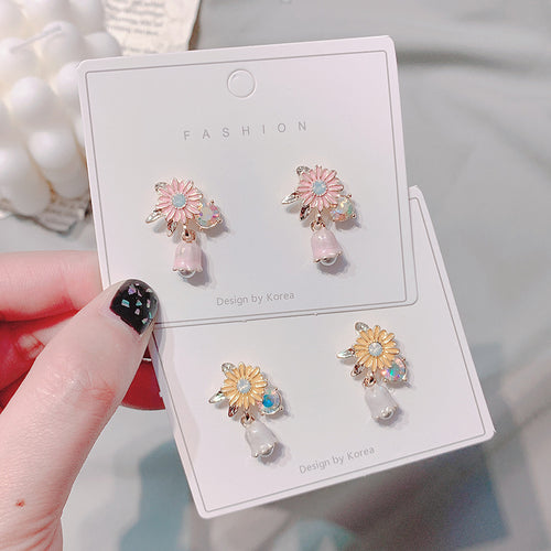 Korean version of the small fresh hand-made daisy bell pendant earrings 925 silver needle spring style rural style mix and match earrings