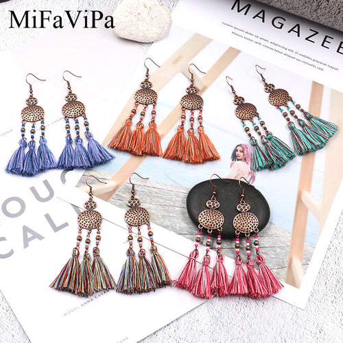 New European and American bohemian personality exaggerated braided silk geometric earrings tassel scalloped earrings